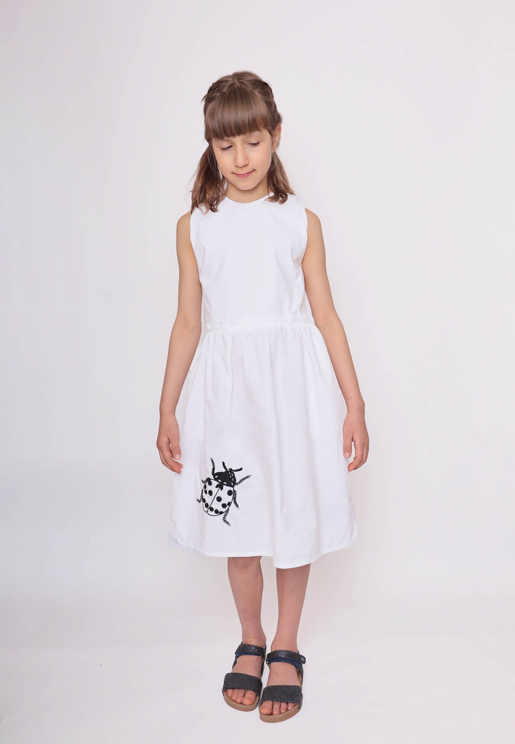 White Dress with Cutout Back and Ladybug Hand Embroidery