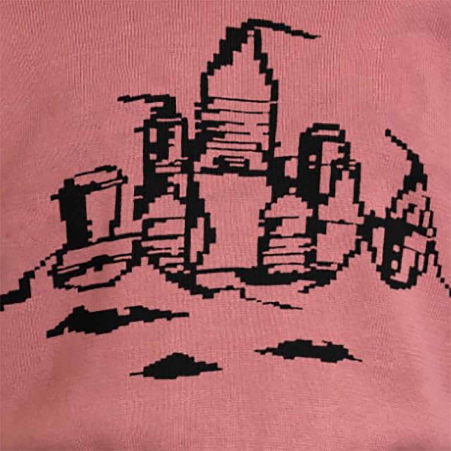 Roze gebreide top met strandkasteel voor kinderen 